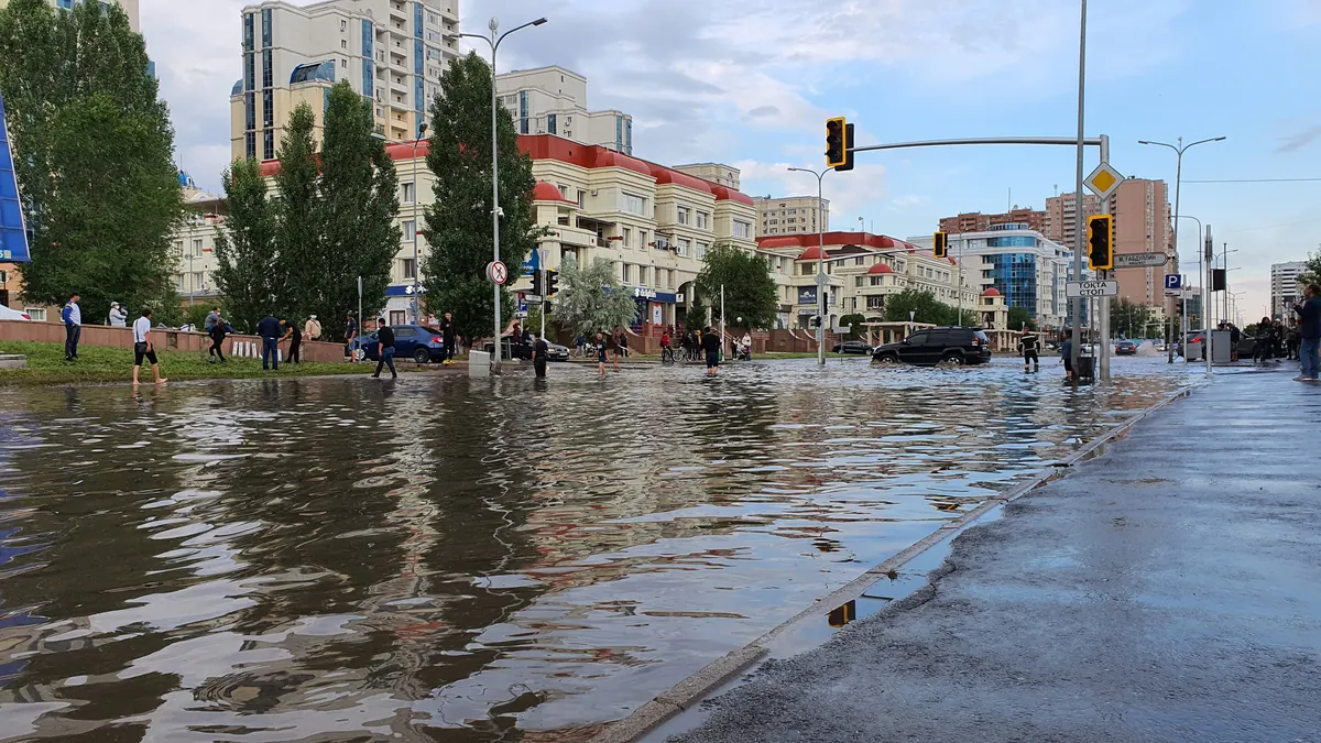 Street flooding after heavy rain pushing runoff toward homes, like Tucson monsoon flooding