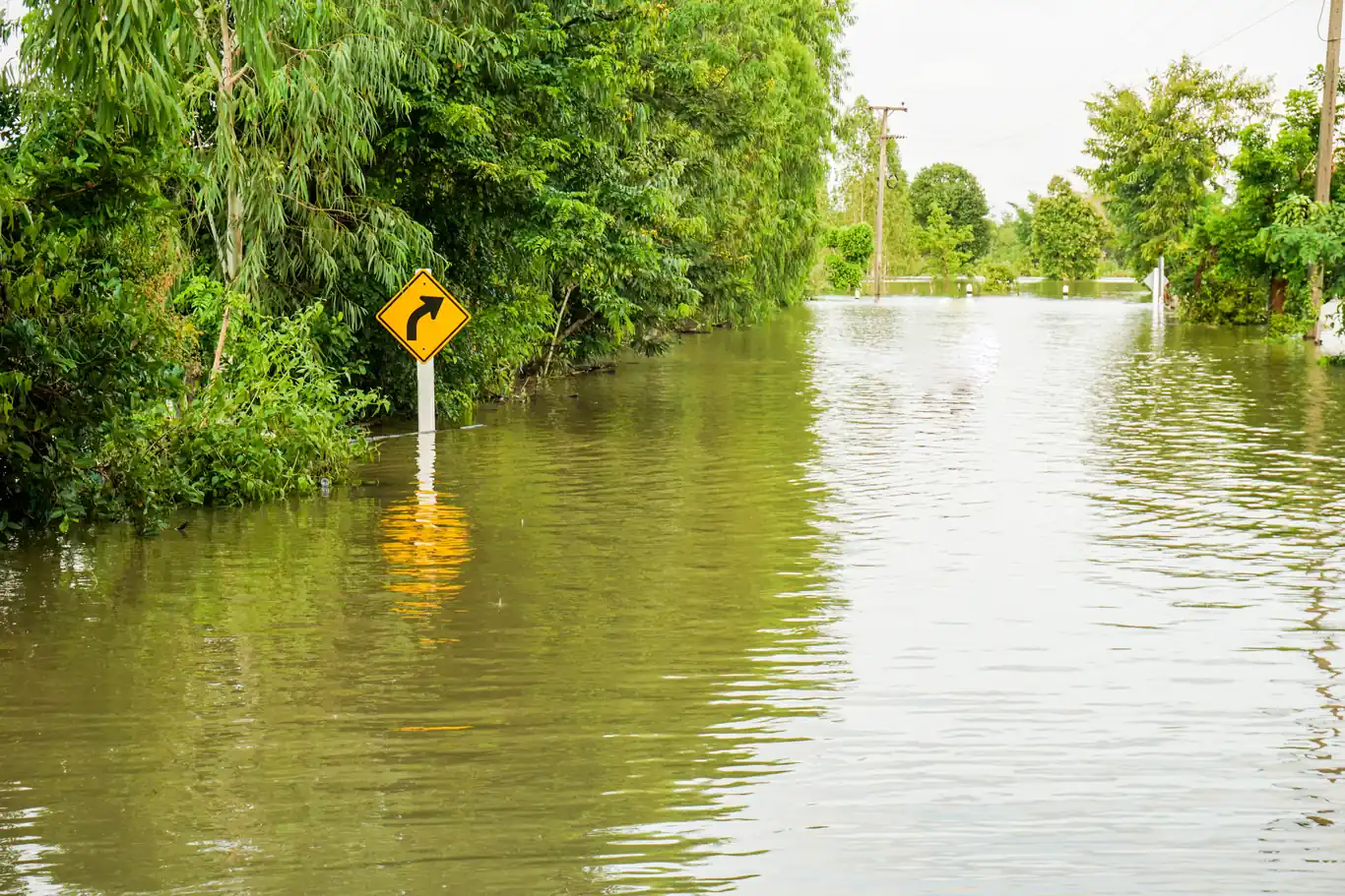 Monsoon storm runoff flooding low ground near Vail, AZ