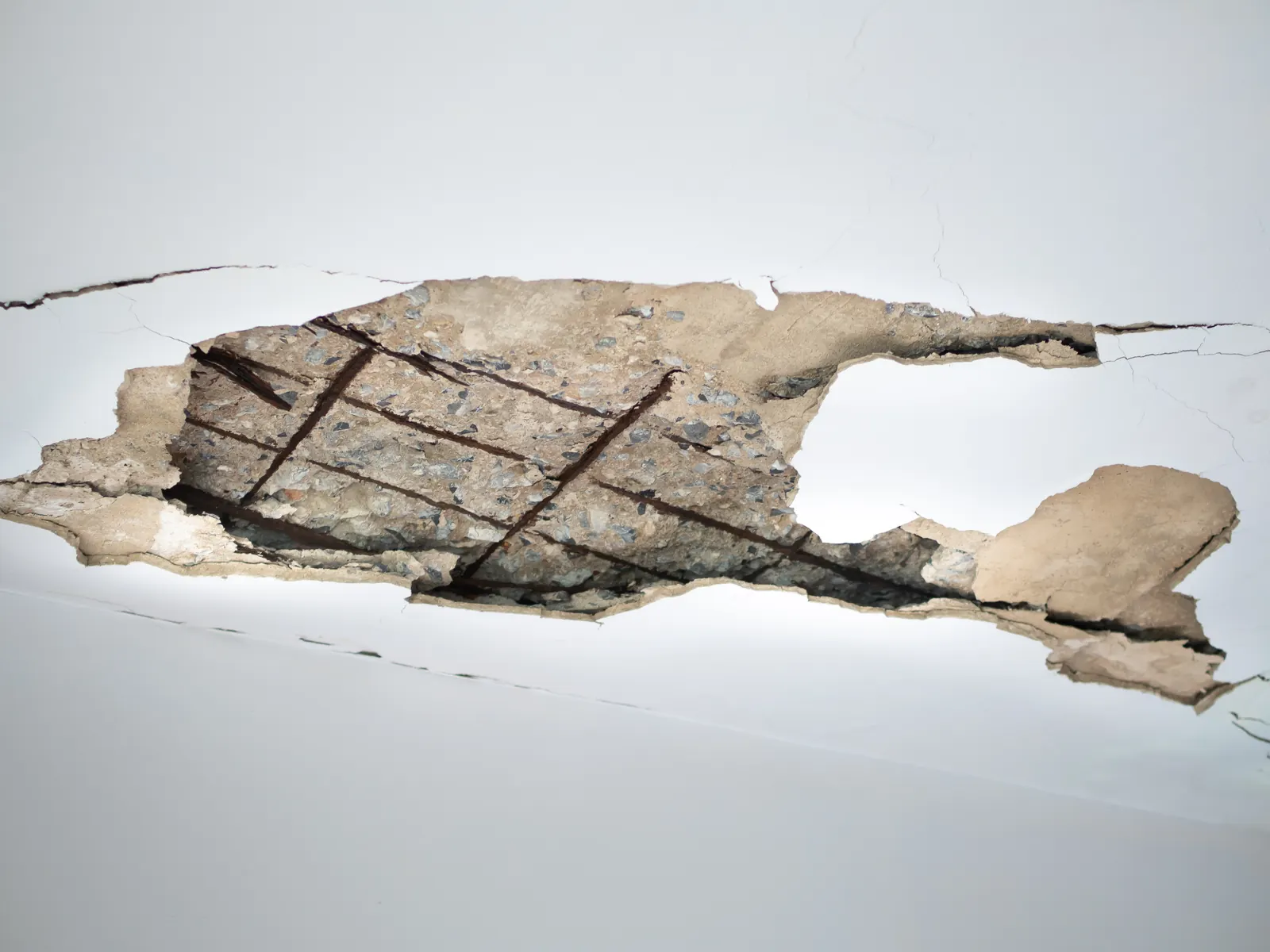 Cracked, water-damaged ceiling from a leaking cooler supply line in a Sahuarita, AZ home